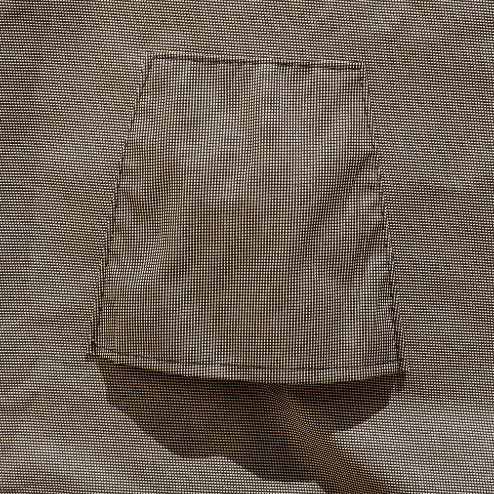 Budge cover draped over patio chair demonstrating full 36x36x36 inch coverage