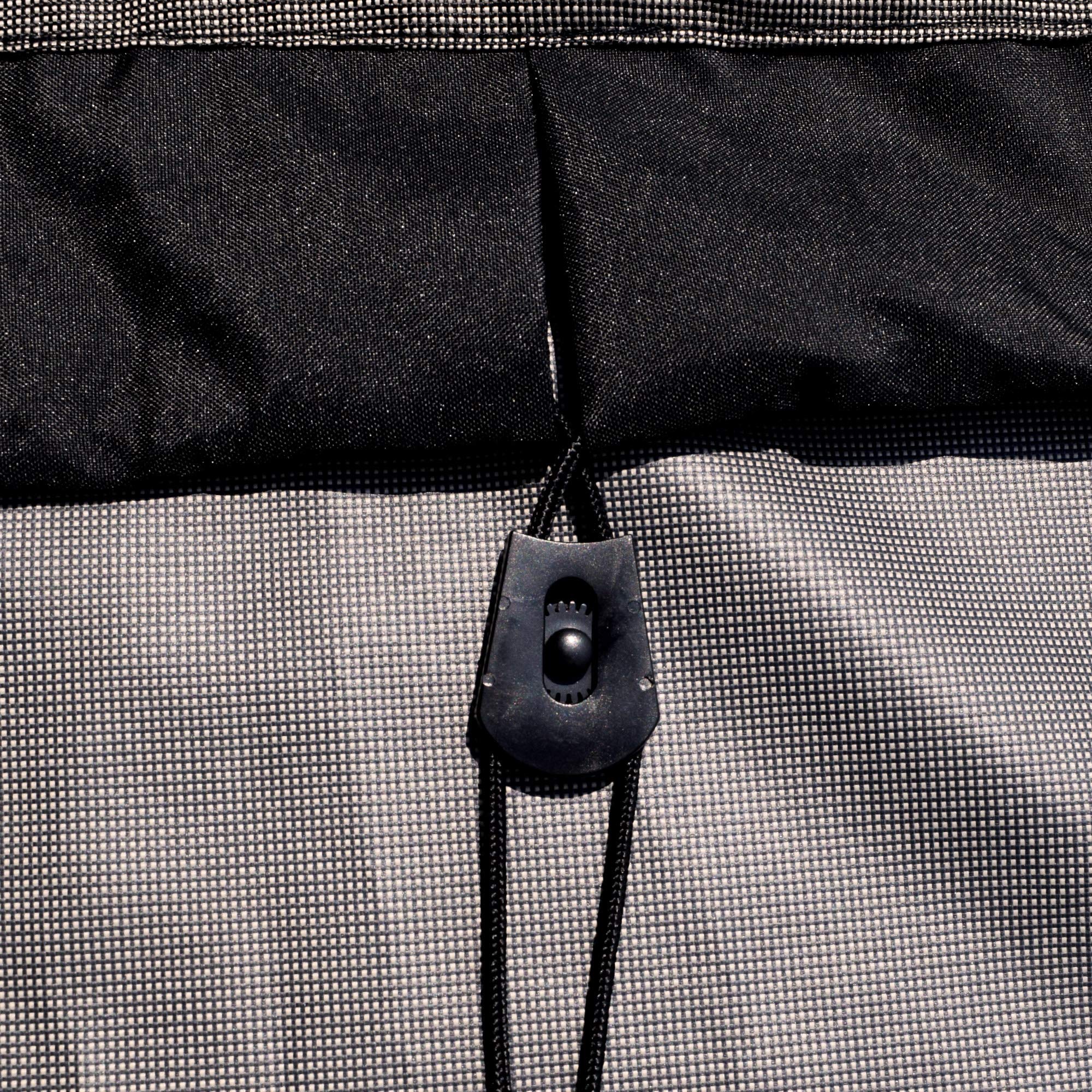 Budge straps and buckles secured to chair leg for wind-resistant fastening