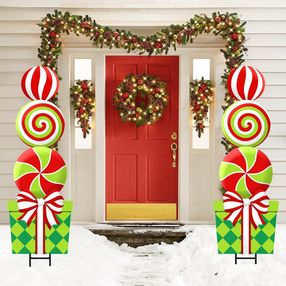 Bunny Chorus paired lollipop signs installed in a front lawn for festive curb impact
