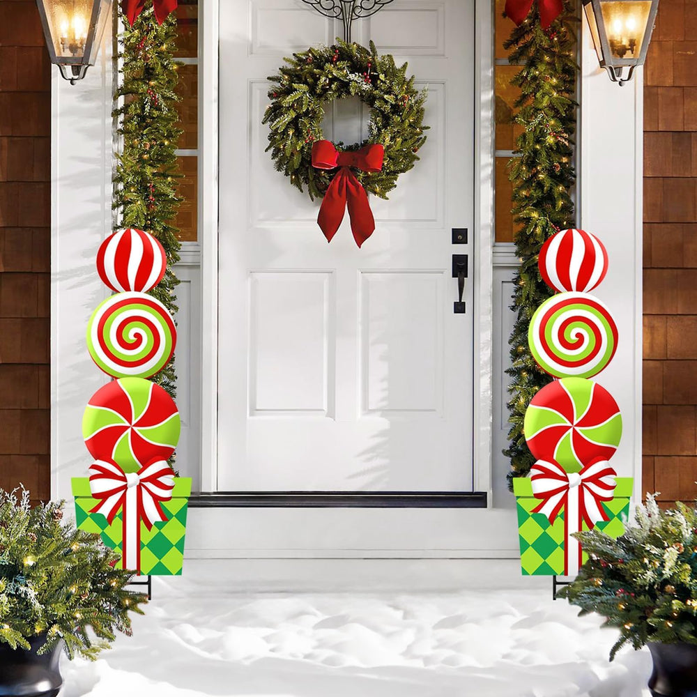 Bunny Chorus lollipop decorations flanking a porch doorway creating welcoming entrance