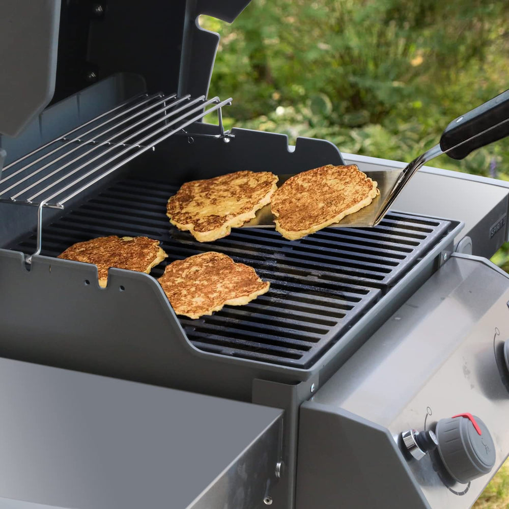 Burly Grill lifestyle backyard scene with grates in use highlighting improved grill marks
