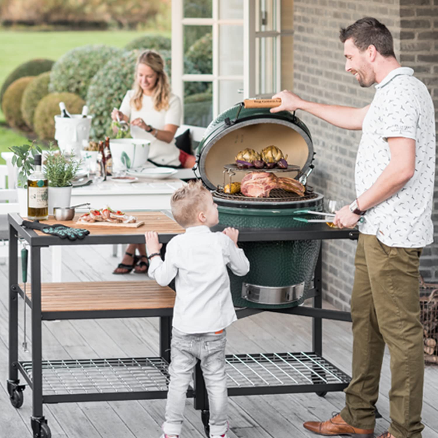 Burly Grill lifestyle scene with multiple dishes showing versatility benefit
