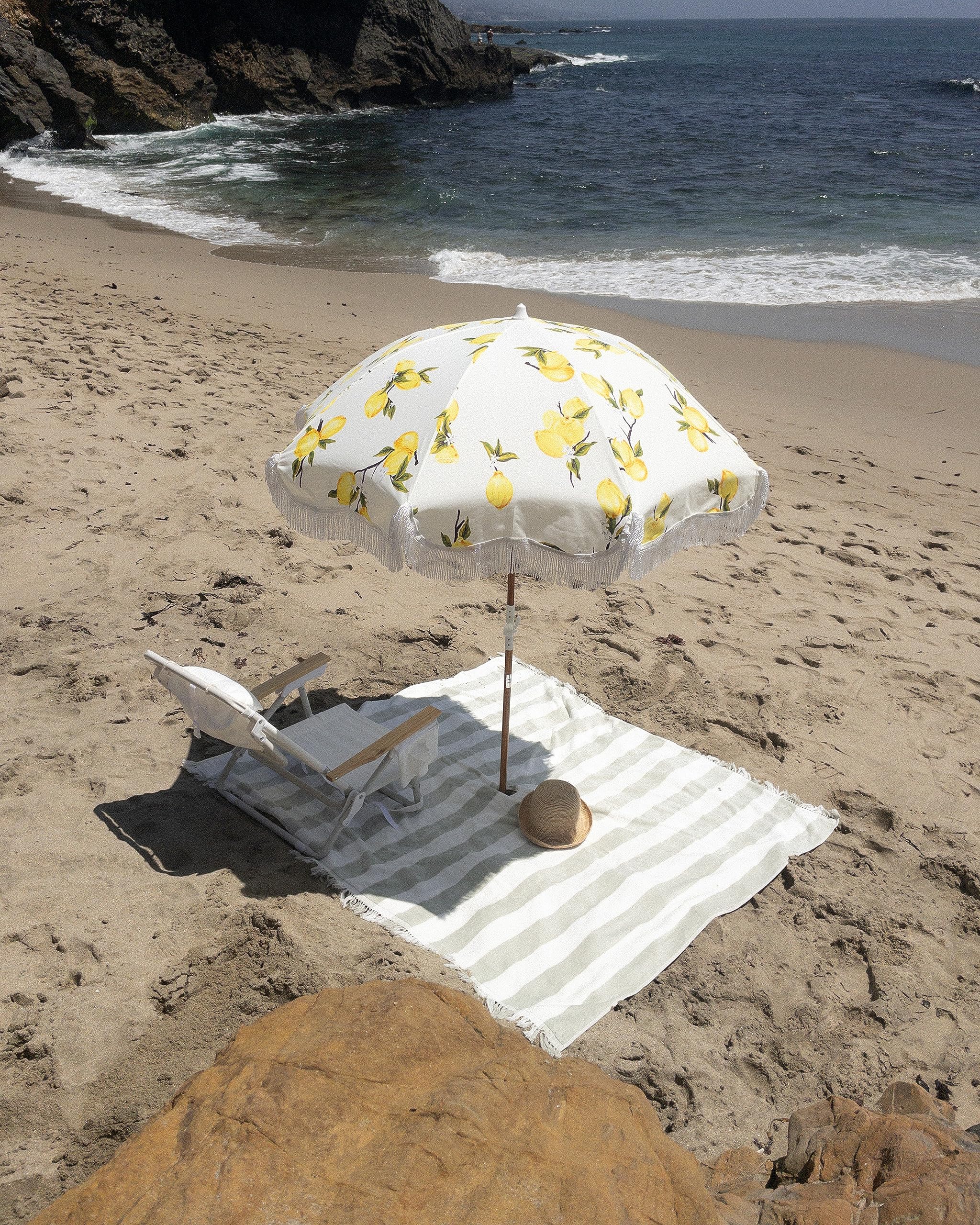 Business & Pleasure Co. tilting wood pole detail showing 1-inch pole and easy-angle shade benefit