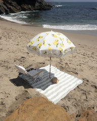 Business & Pleasure Co. tilting wood pole detail showing 1-inch pole and easy-angle shade benefit