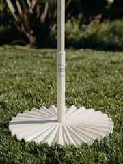 Business & Pleasure Co. pole insert detail showing secure fit for smaller-diameter umbrella poles