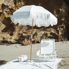 Business & Pleasure Co. wood pole tilt mechanism shown for adjustable directional shade