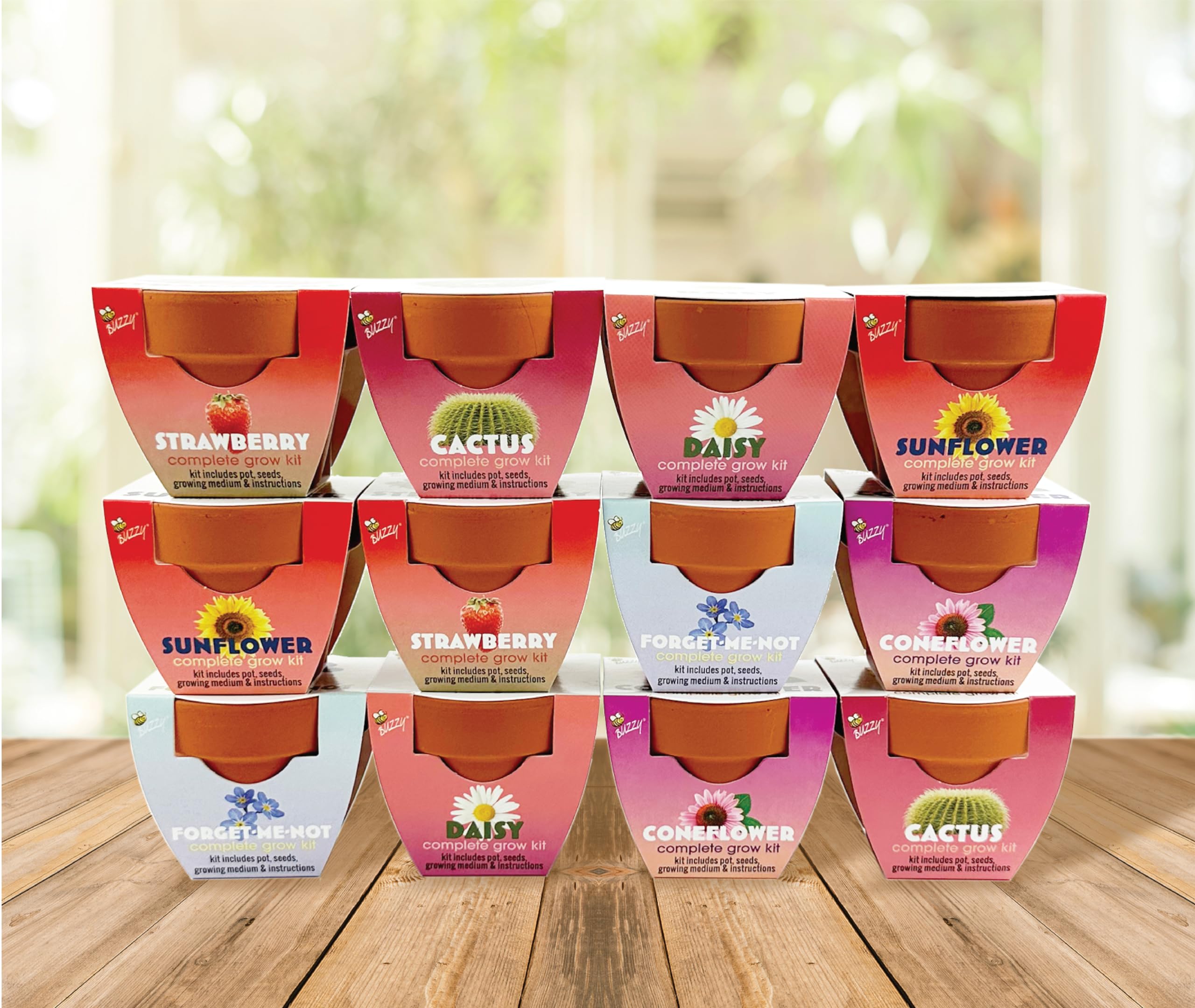 BUZZY mini pots used as event favors on a decorated table setting