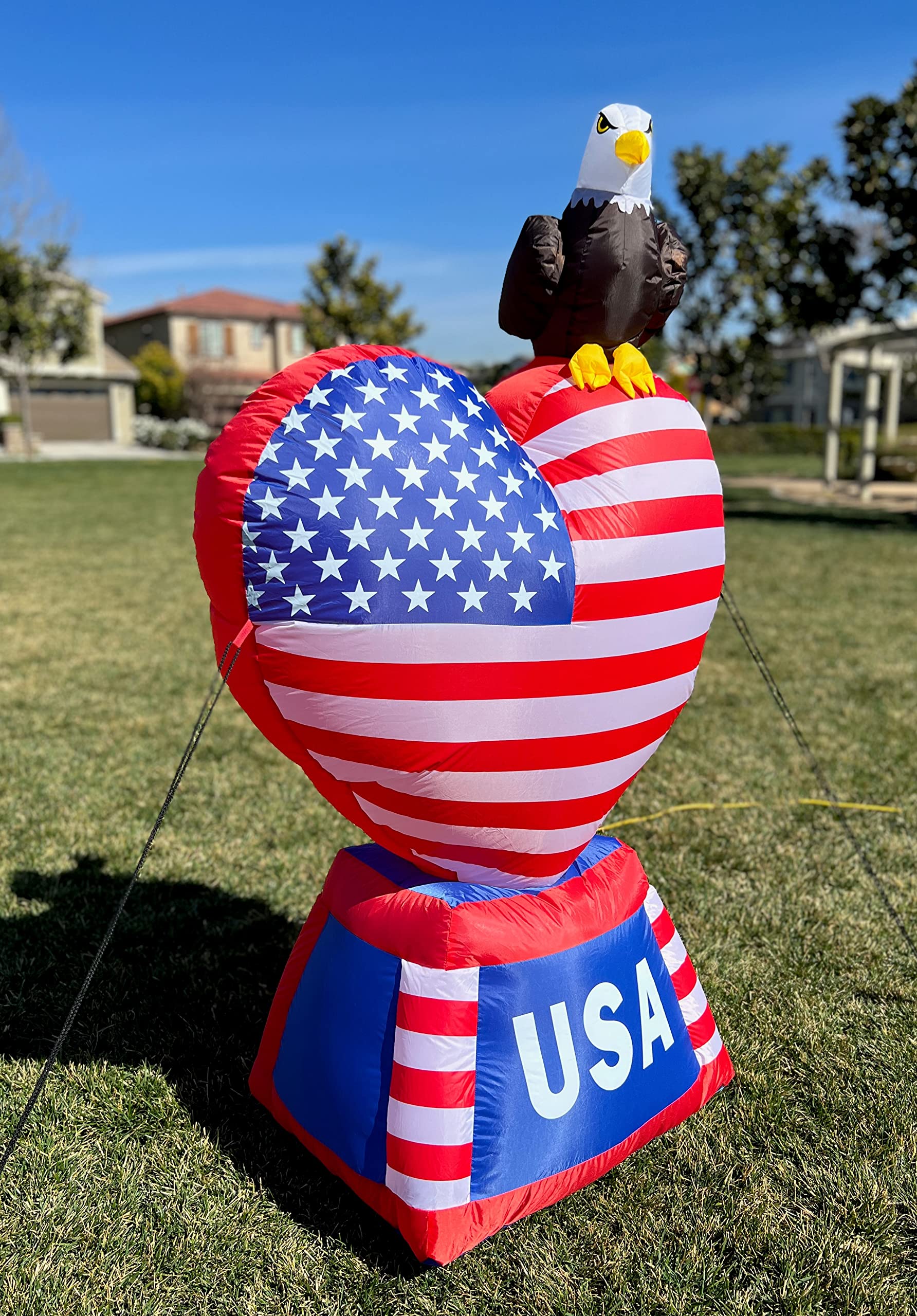 BZB Goods inflatable heart on a lawn in use attracting attention and festive ambiance