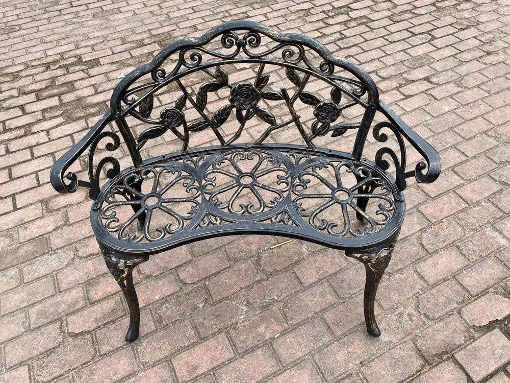 C/G patio casa bench next to chair for scale showing compact footprint