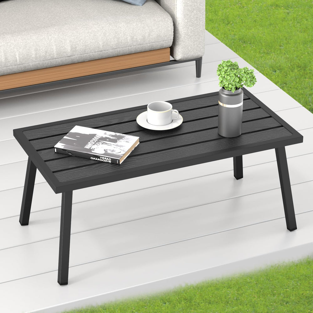 C-Hopetree size comparison next to chair showing compact footprint and versatility