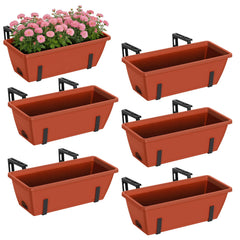 CADUKE front view of six red planter boxes showing neat organized display and curb appeal