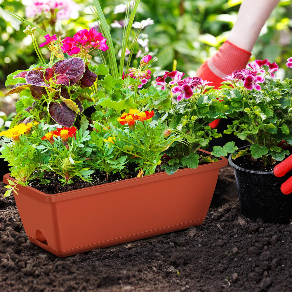 CADUKE planter in use with colorful flowers adding balcony curb appeal