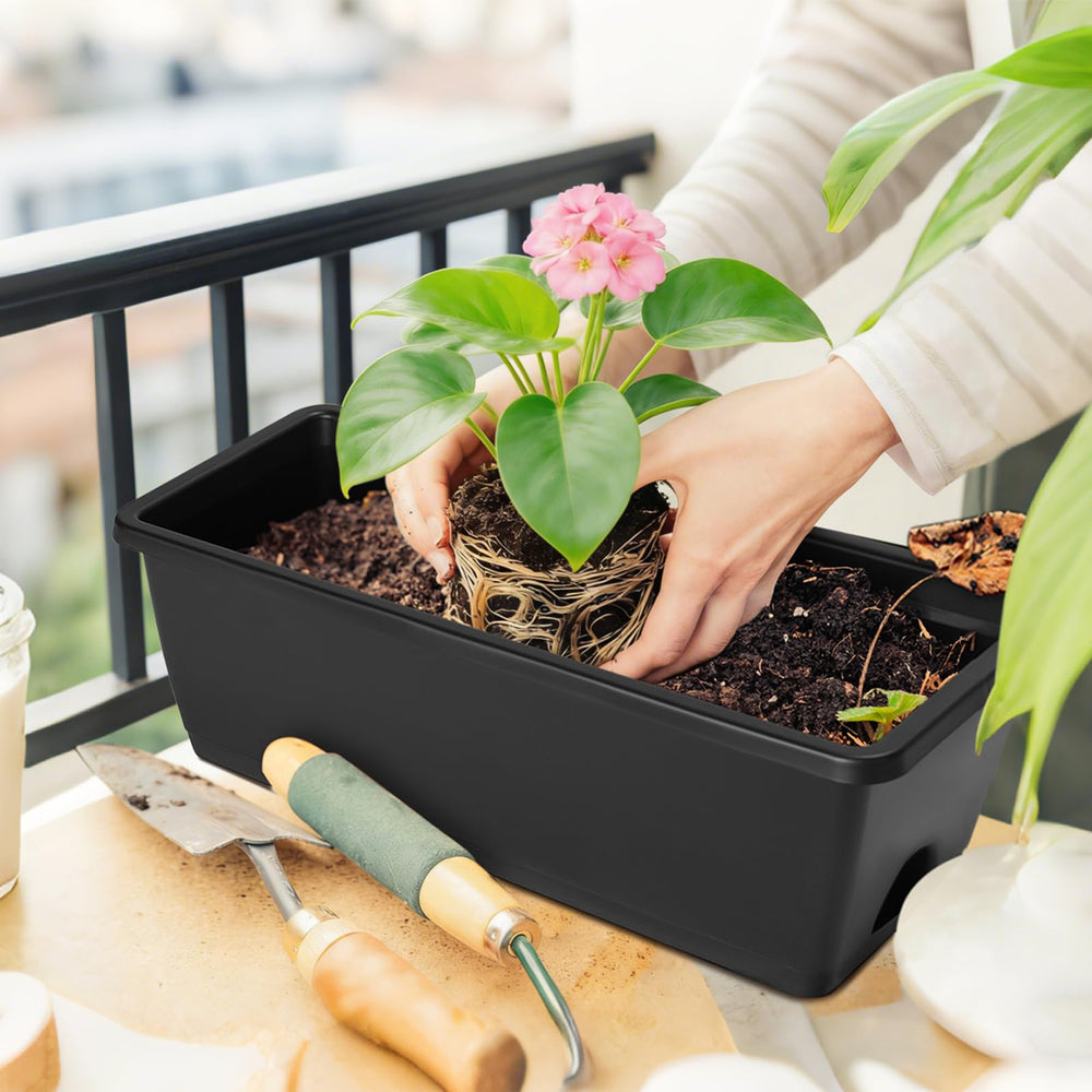 CADUKE planter next to ruler showing size 16.9 x 6.9 x 5.5 inches for planning