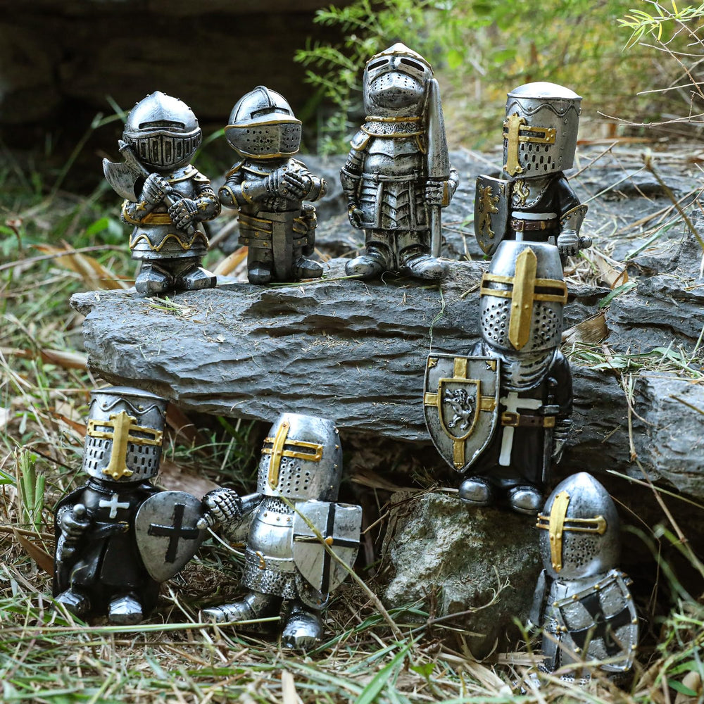 CAFELE knight gnome beside a hand to show scale and compact size ideal for pots and desktops