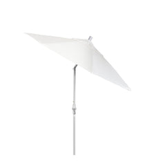California Umbrella over patio table lifestyle scene showing comfortable shaded seating and bright aesthetic