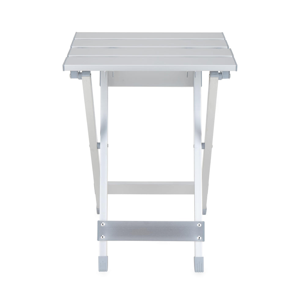 Camco table supporting camping stove demonstrating stable cooking surface