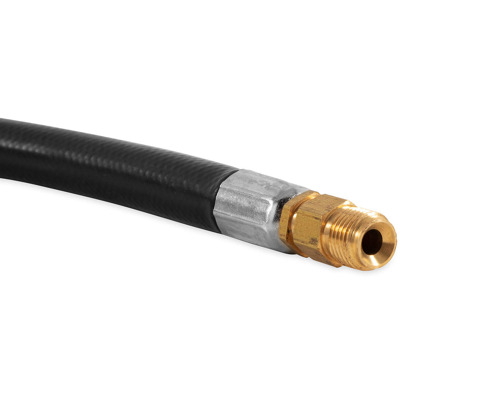 Camco pigtail connected to RV regulator demonstrating safe, leak-free in-use setup