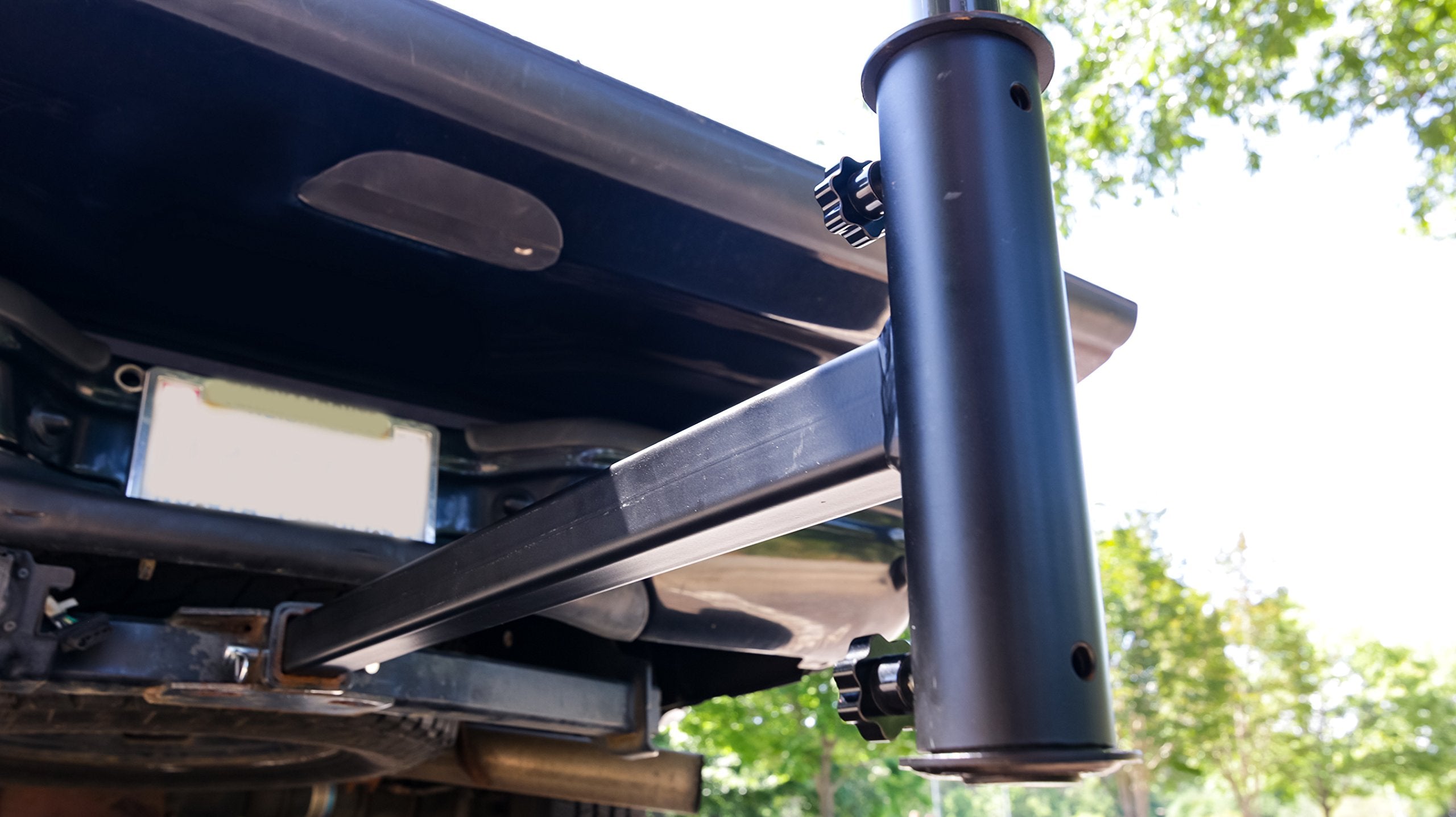 Camco mounted on truck tailgate creating instant shade for tailgating benefit