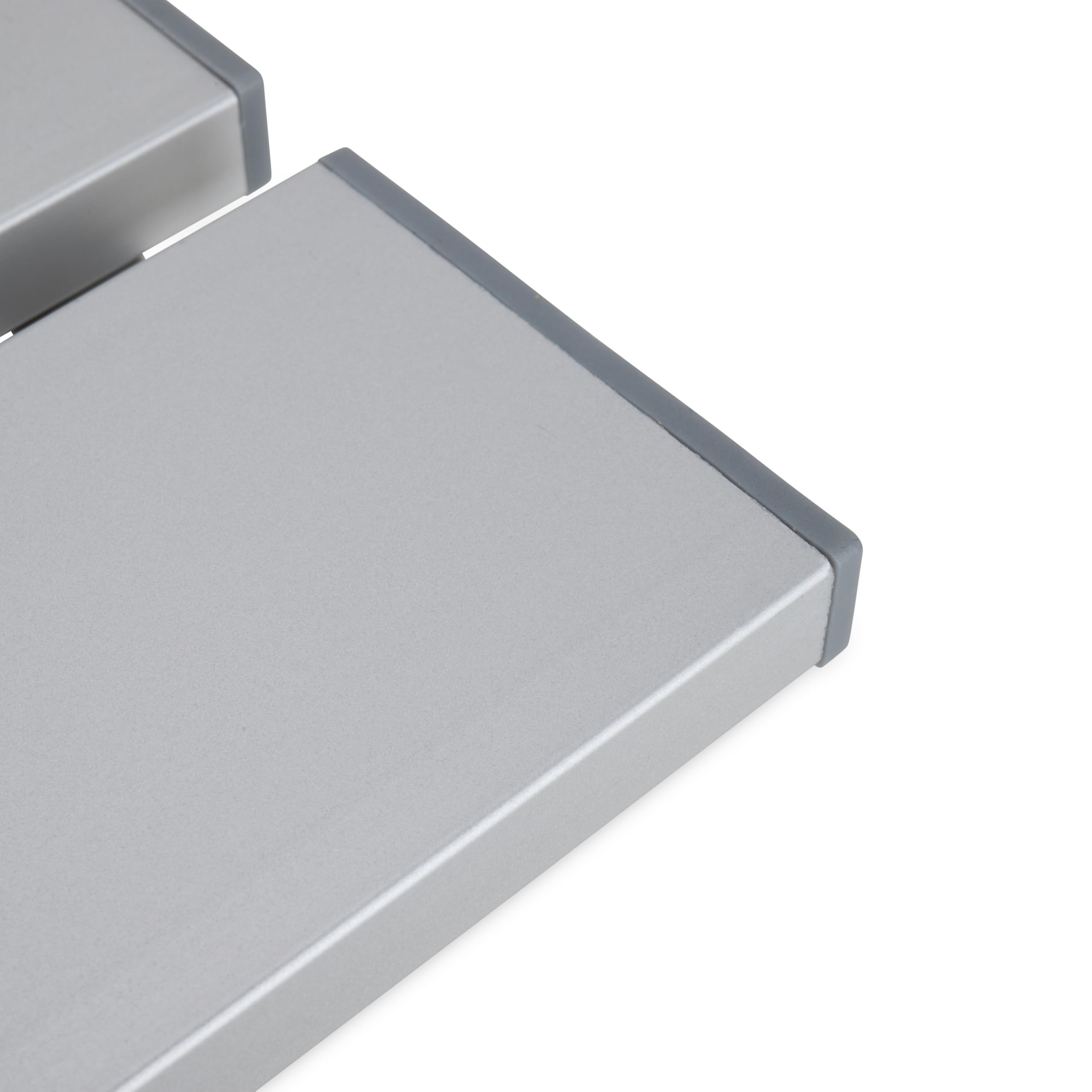 Camco table next to chair showing scale and convenient reach benefit