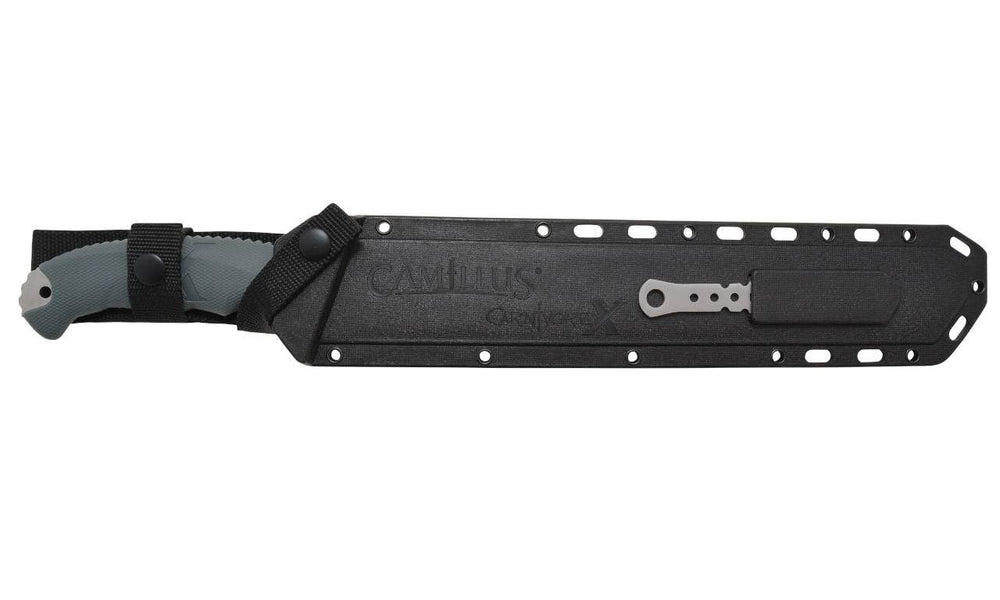 Camillus machete held in hand for scale showing blade length and ergonomic grip