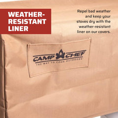 Camp Chef hooks and bungee cords fastening, keeping cover secure in wind
