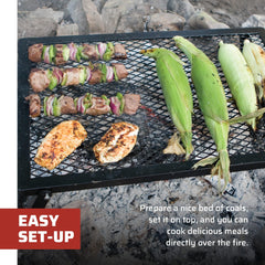 Camp Chef Lumberjack in use over coals illustrating stable cooking directly on fire