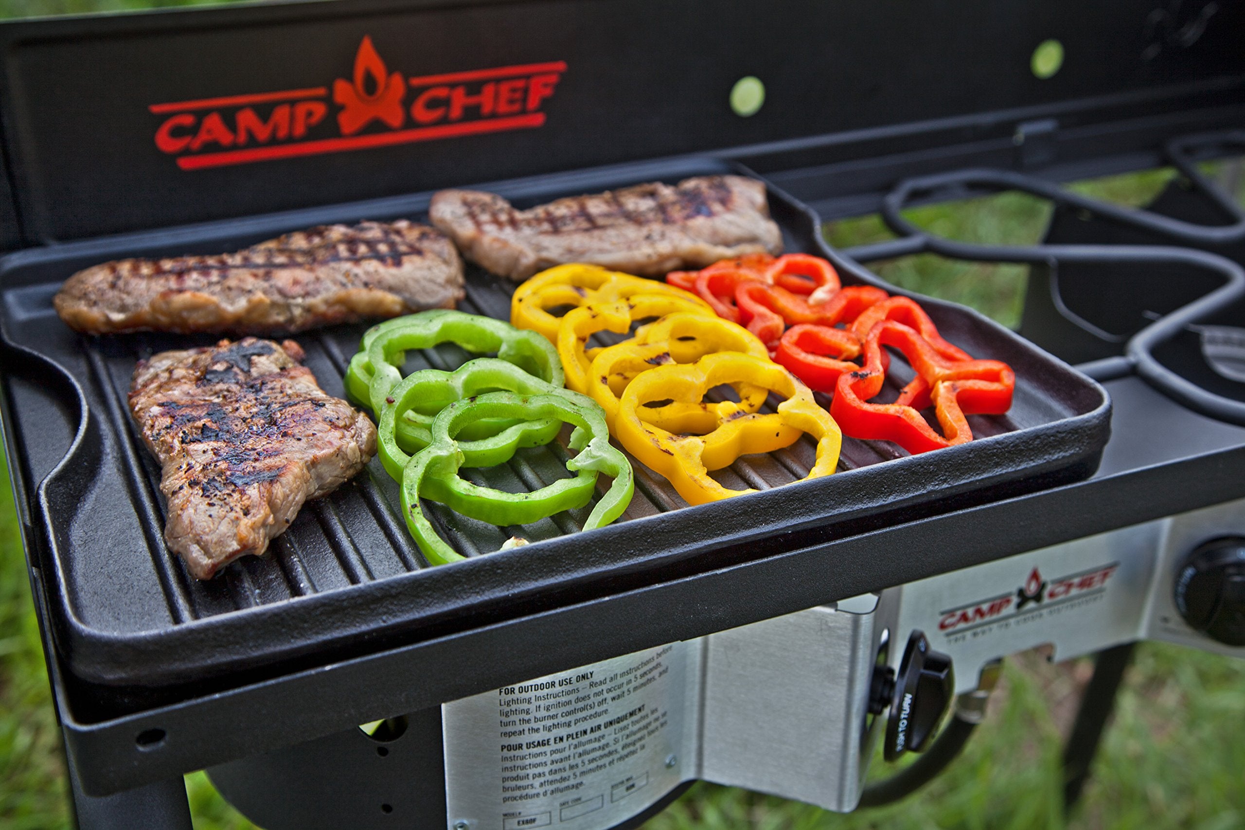 Camp Chef close-up of ribbed grill side highlighting sear marks and fat drainage benefit
