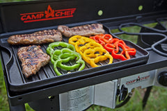 Camp Chef close-up of ribbed grill side highlighting sear marks and fat drainage benefit