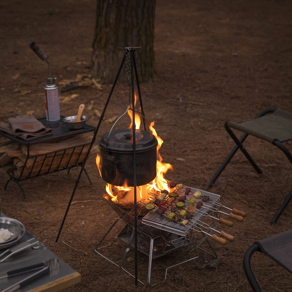 camping moon grill cooking steak demonstrating high-heat searing performance
