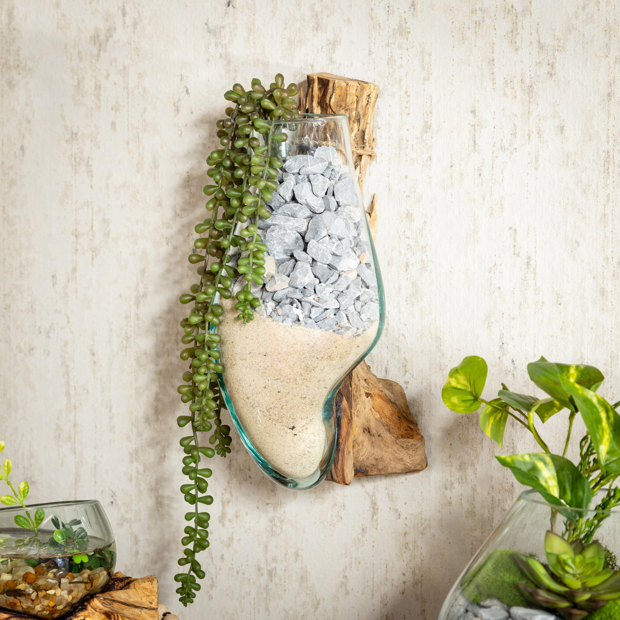 Cape Craftsmen beside hand for scale conveys compact, easy-to-hang benefit