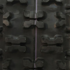 Carlisle Snow Hog tread closeup highlighting X-pattern for better traction