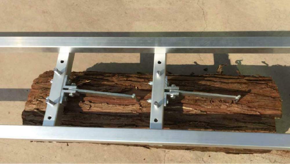 Carmyra lifestyle view on jobsite with milled slab, shows finished lumber ready for projects