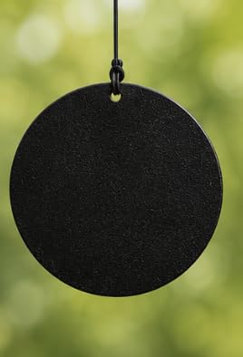 Carson wind chime hanging from porch rail providing ambient patio sound