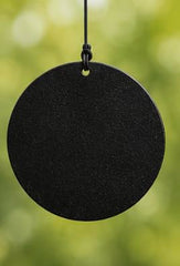Carson wind chime hanging from porch rail providing ambient patio sound