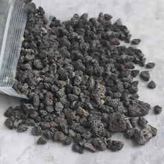CARURBODY lava rocks used as top dressing in a succulent planter for tidy look