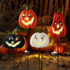 Cbumane front view of four pumpkin stakes enhancing curb appeal
