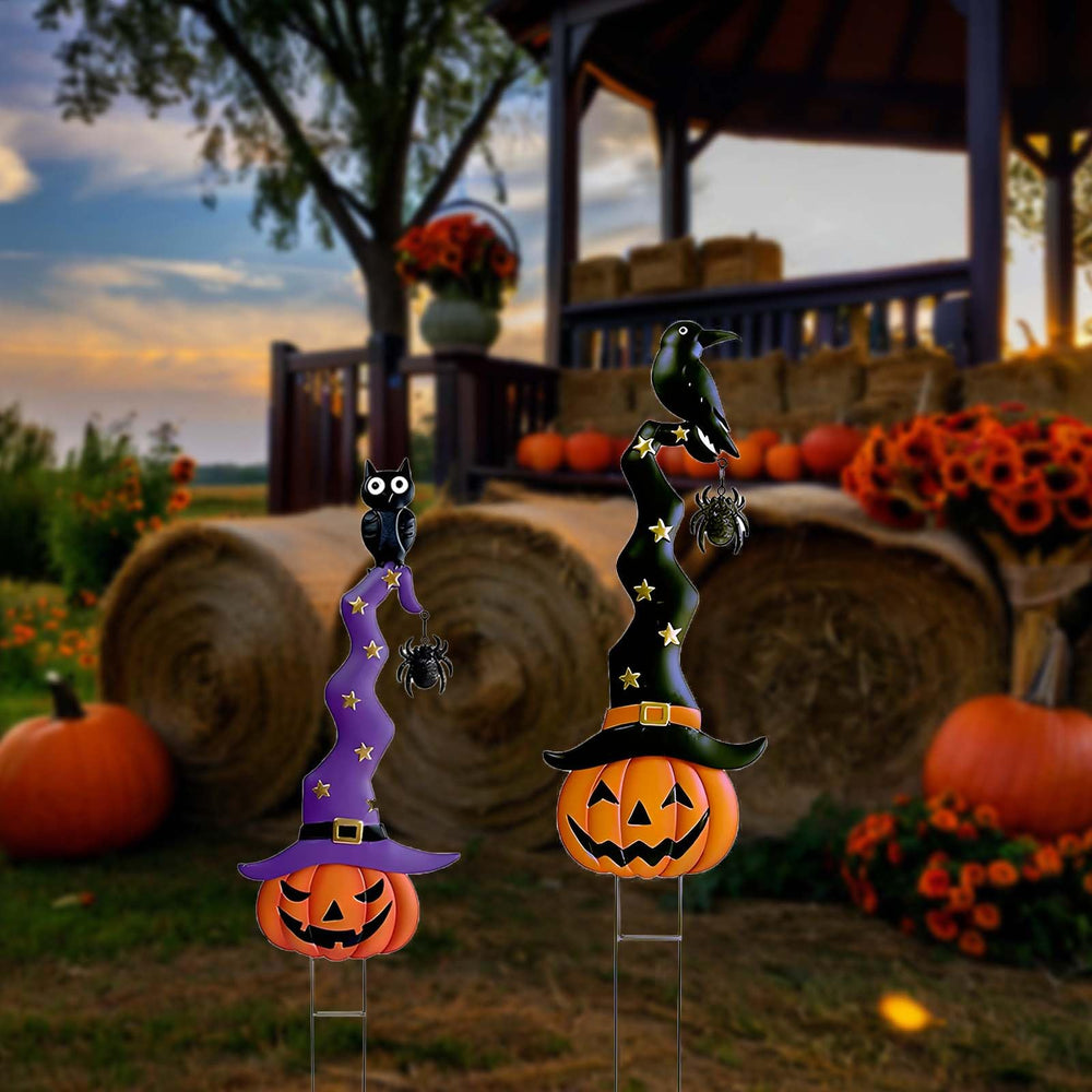 Cbumane paired stakes in lawn creating welcoming Halloween pathway accent