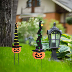 Cbumane side profile of witch hat on pumpkin showing playful silhouette