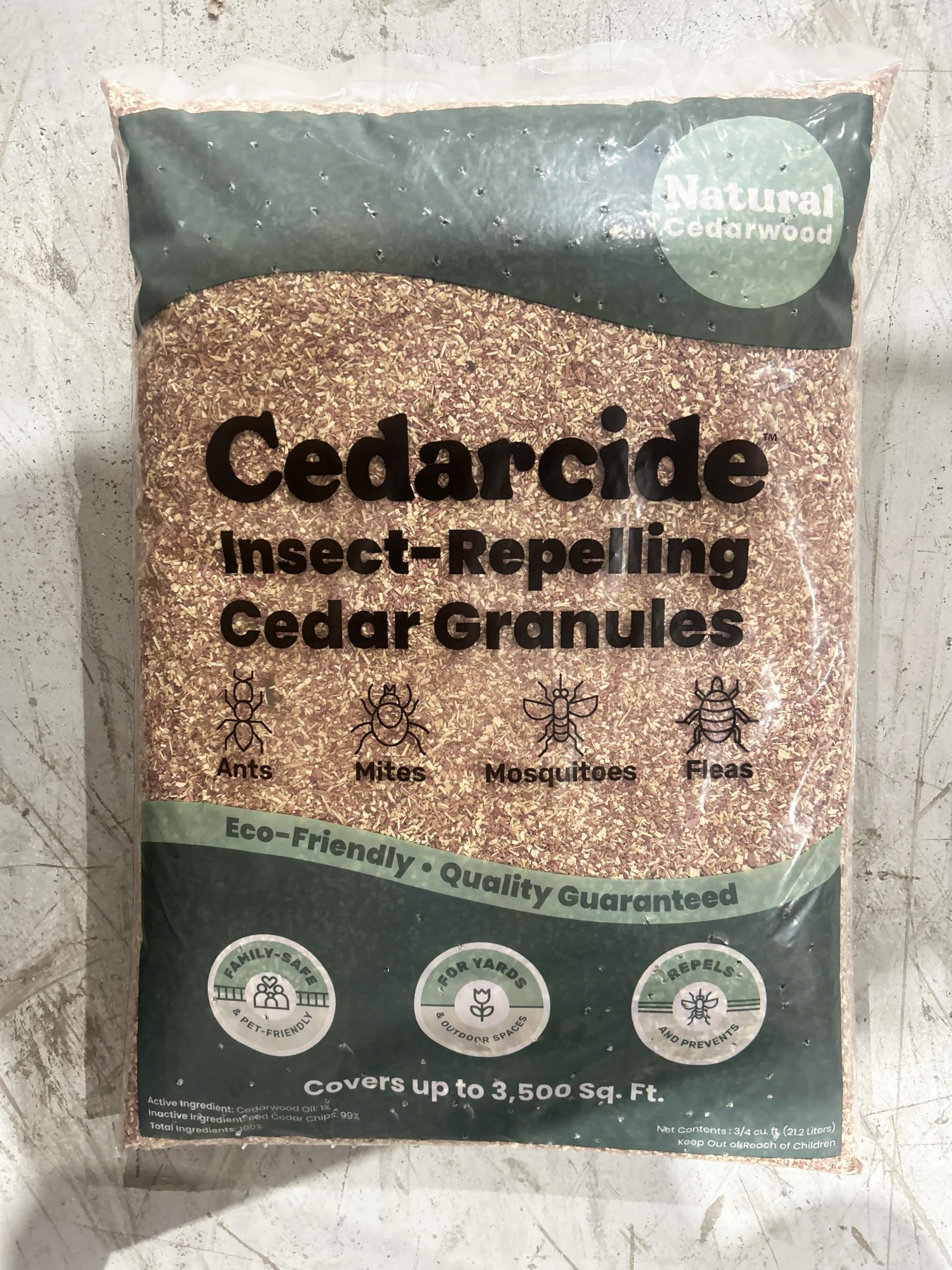 Product label close-up emphasizing Cedarcide pet-safe, all-natural ingredient reassurance