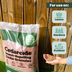 Cedarcide concentrate being sprayed on lawn to reduce outdoor pests