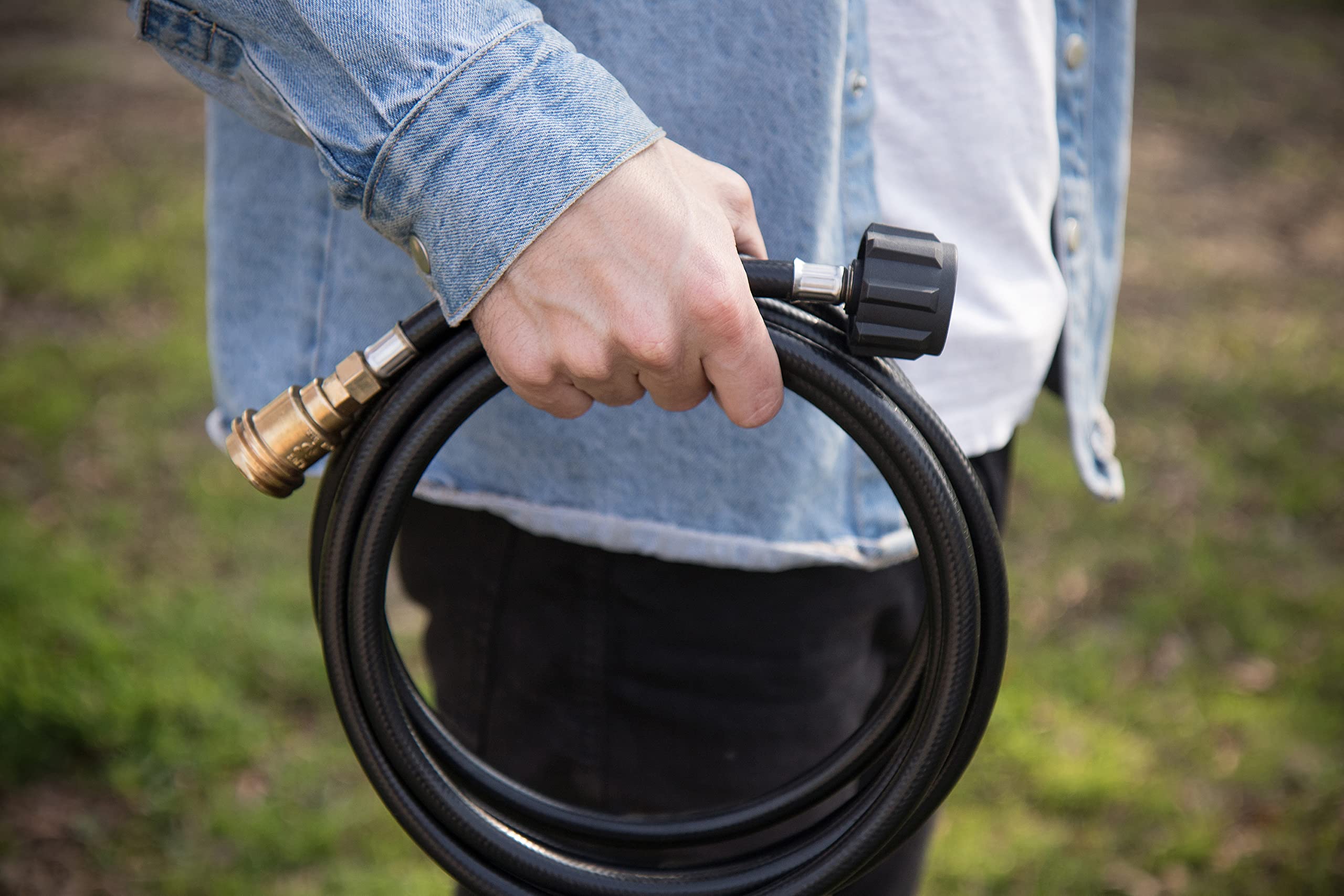 Champion hose connected to generator enabling safer tank placement
