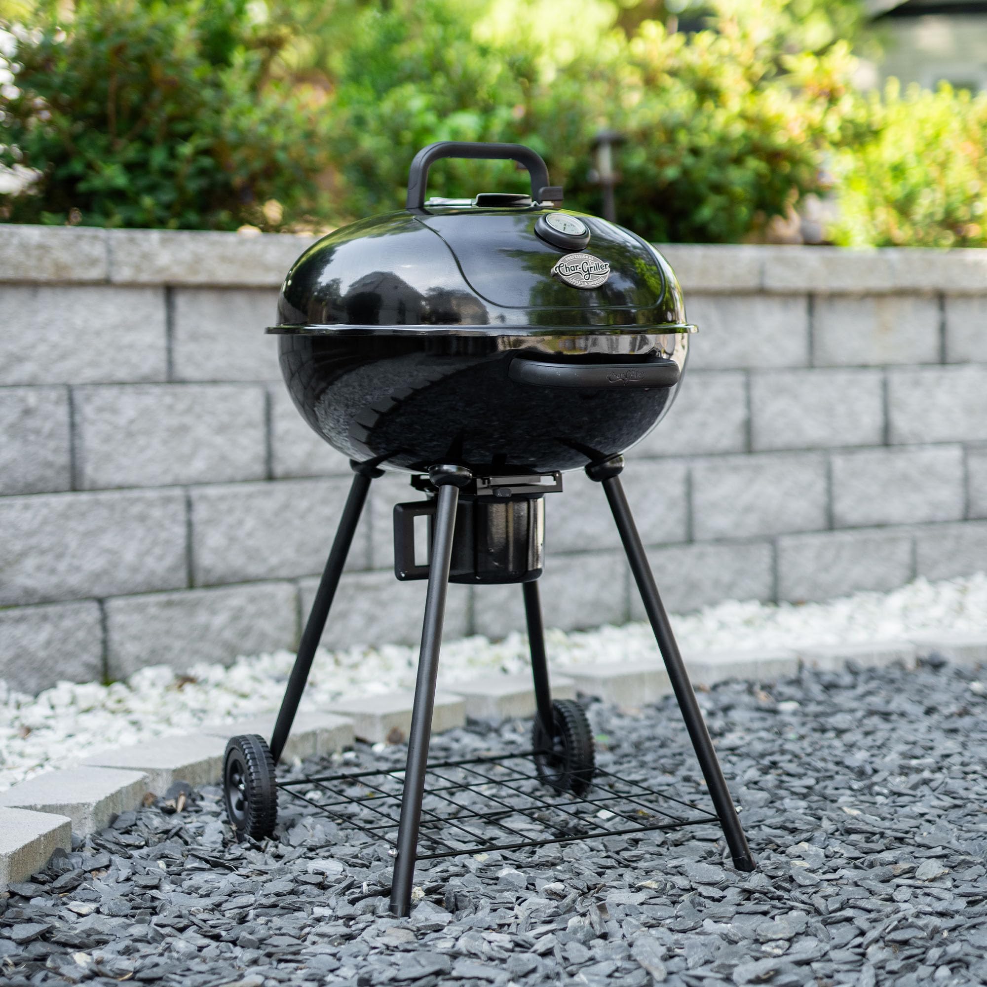 Char-Griller charcoal access door open for easy refueling benefit