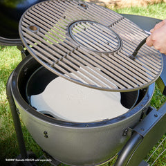 Char-Griller Smokin' Stone installed in AKORN grill creating indirect smoking zone benefit