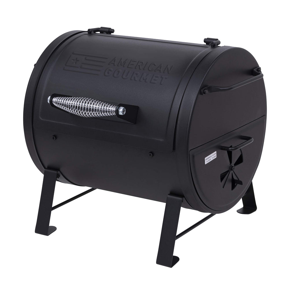 Charbroil pull-out charcoal drawer open for simple fuel handling and cleanup