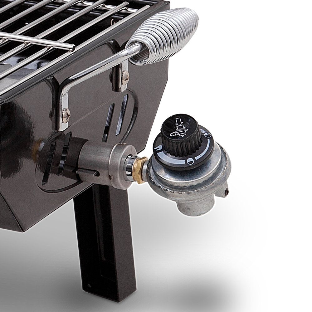 Charbroil size comparison with hands illustrating compact scale for travel