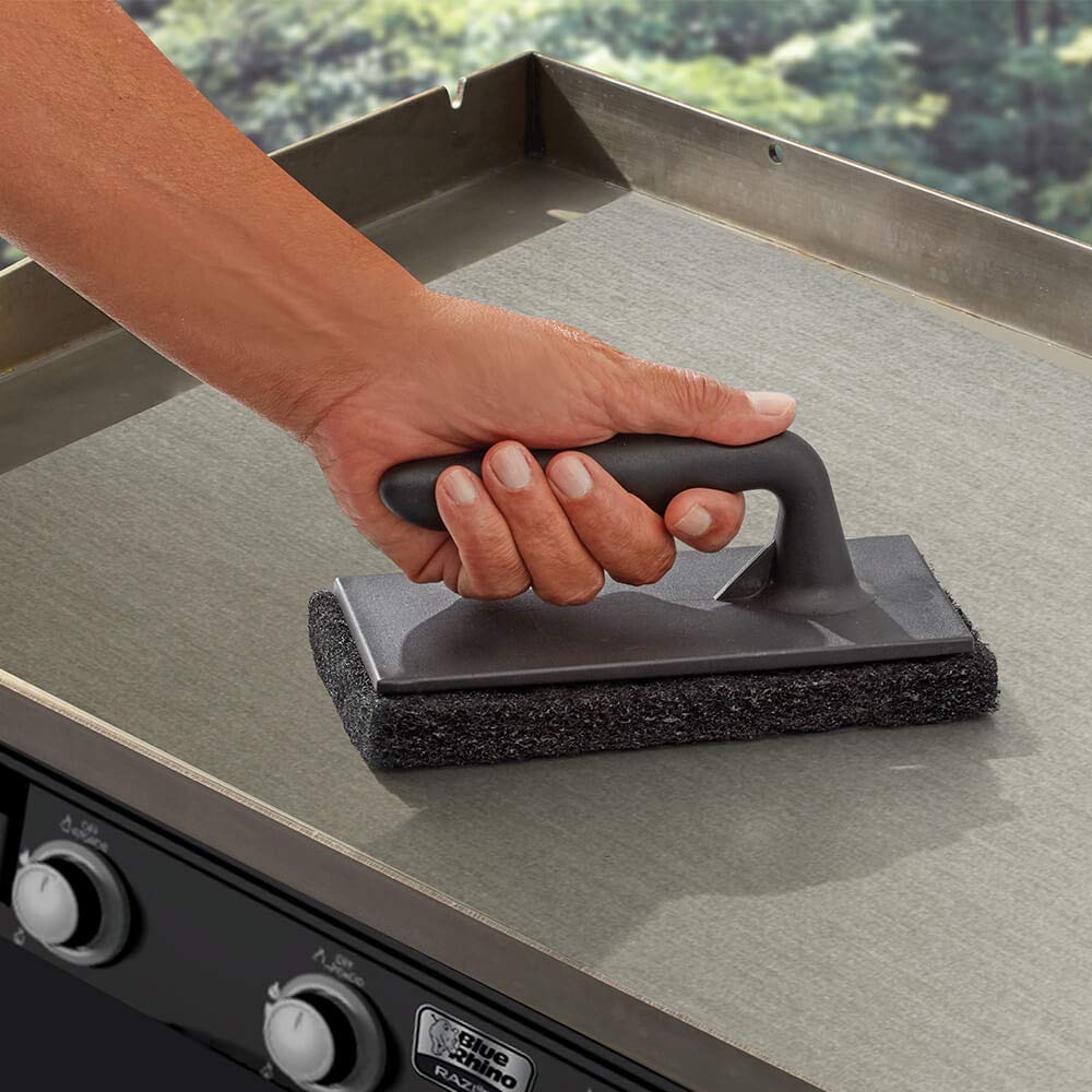 Chef Master close-up of stainless steel blade highlighting sharp edge for heavy grime
