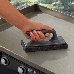Chef Master close-up of stainless steel blade highlighting sharp edge for heavy grime