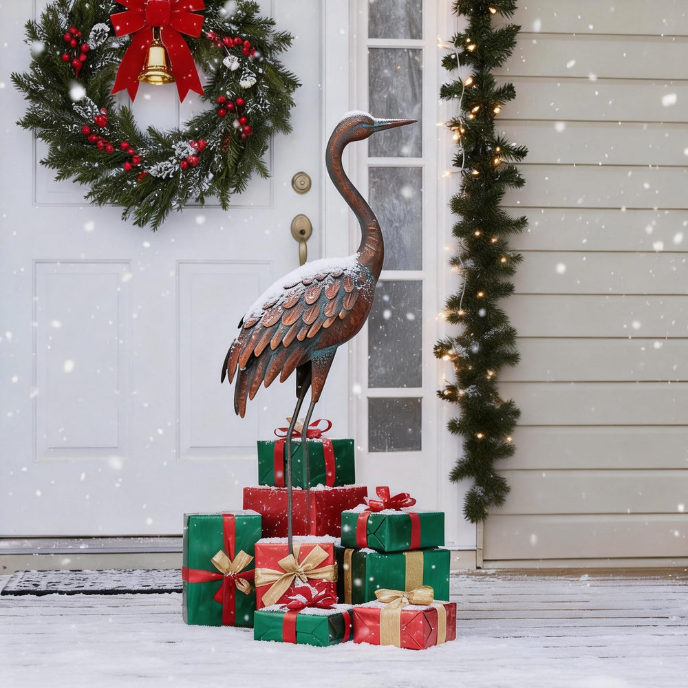 chisheen crane placed among plants illustrating garden focal point and natural fit