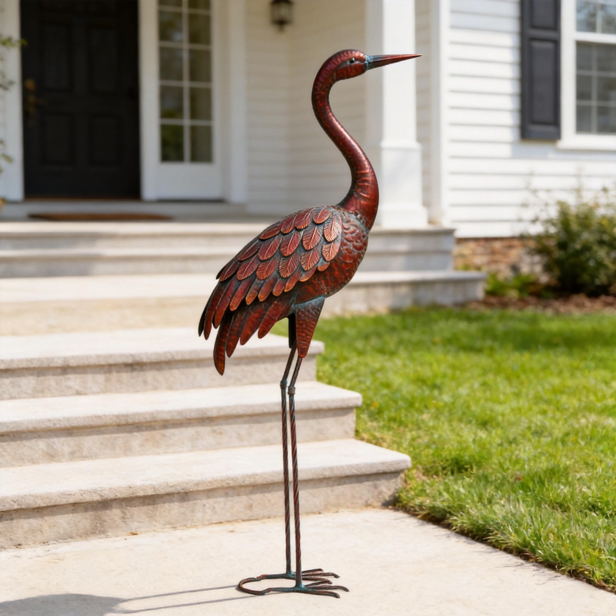 chisheen crane on patio near planter showing decorative use in outdoor living spaces