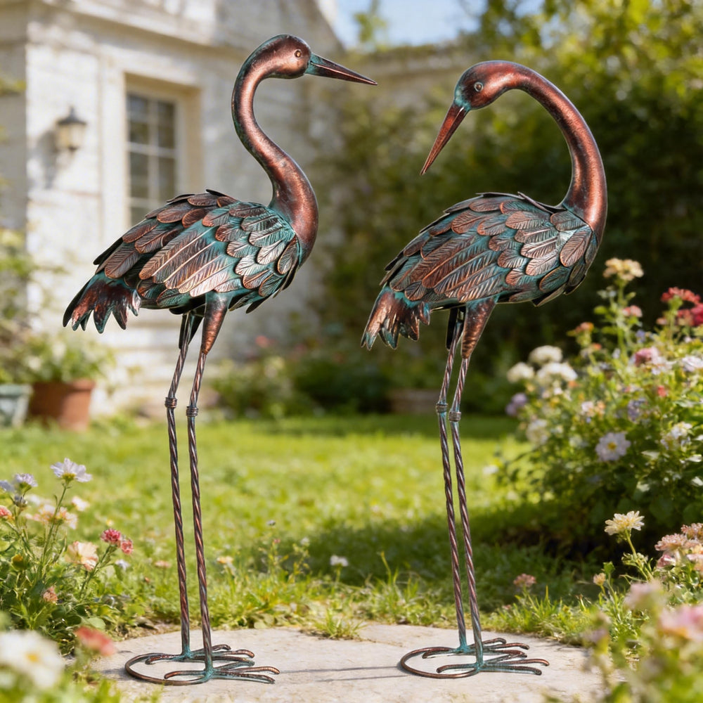chisheen front view of both crane statues showing elegant yard focal point benefit
